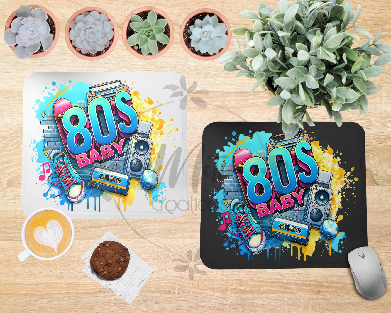 a couple of mouse pads sitting on top of a wooden table