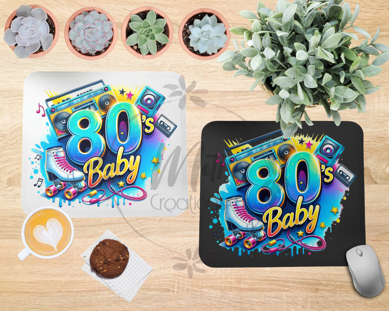a couple of mouse pads sitting on top of a wooden table