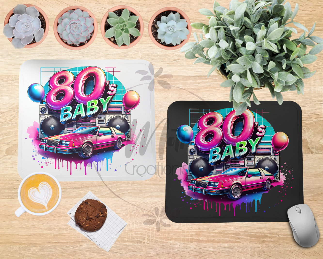 a couple of mouse pads sitting on top of a wooden table