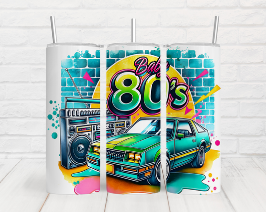 a pair of speakers with a picture of a car on them