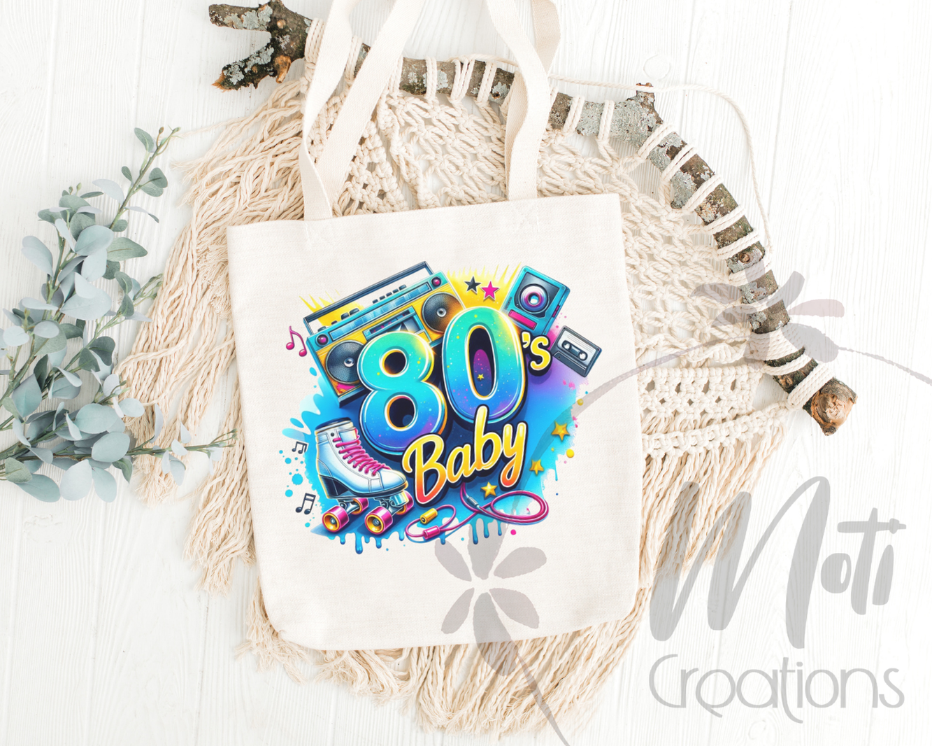 a tote bag with the words 80's baby printed on it
