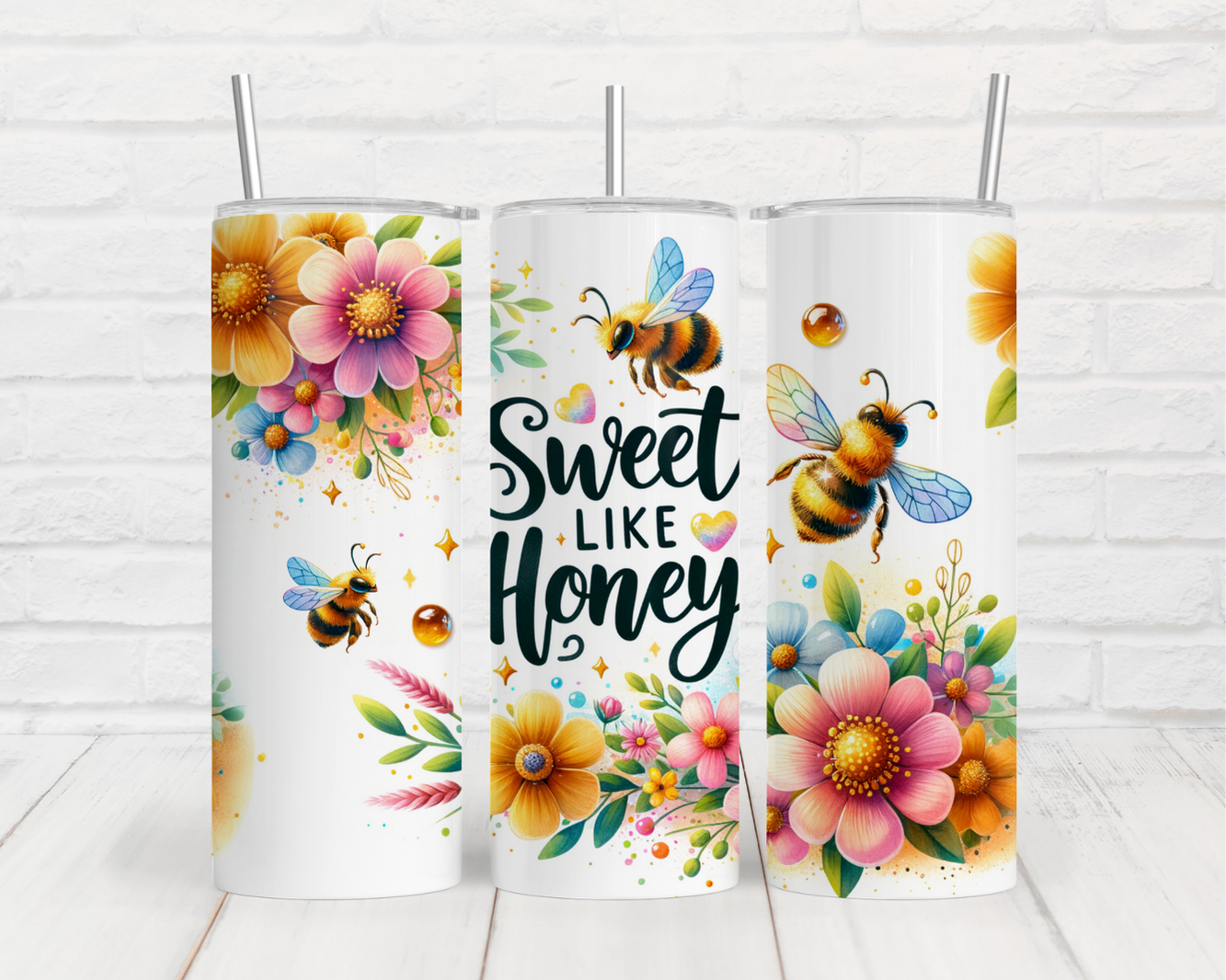 three tumbles with flowers and bees on them