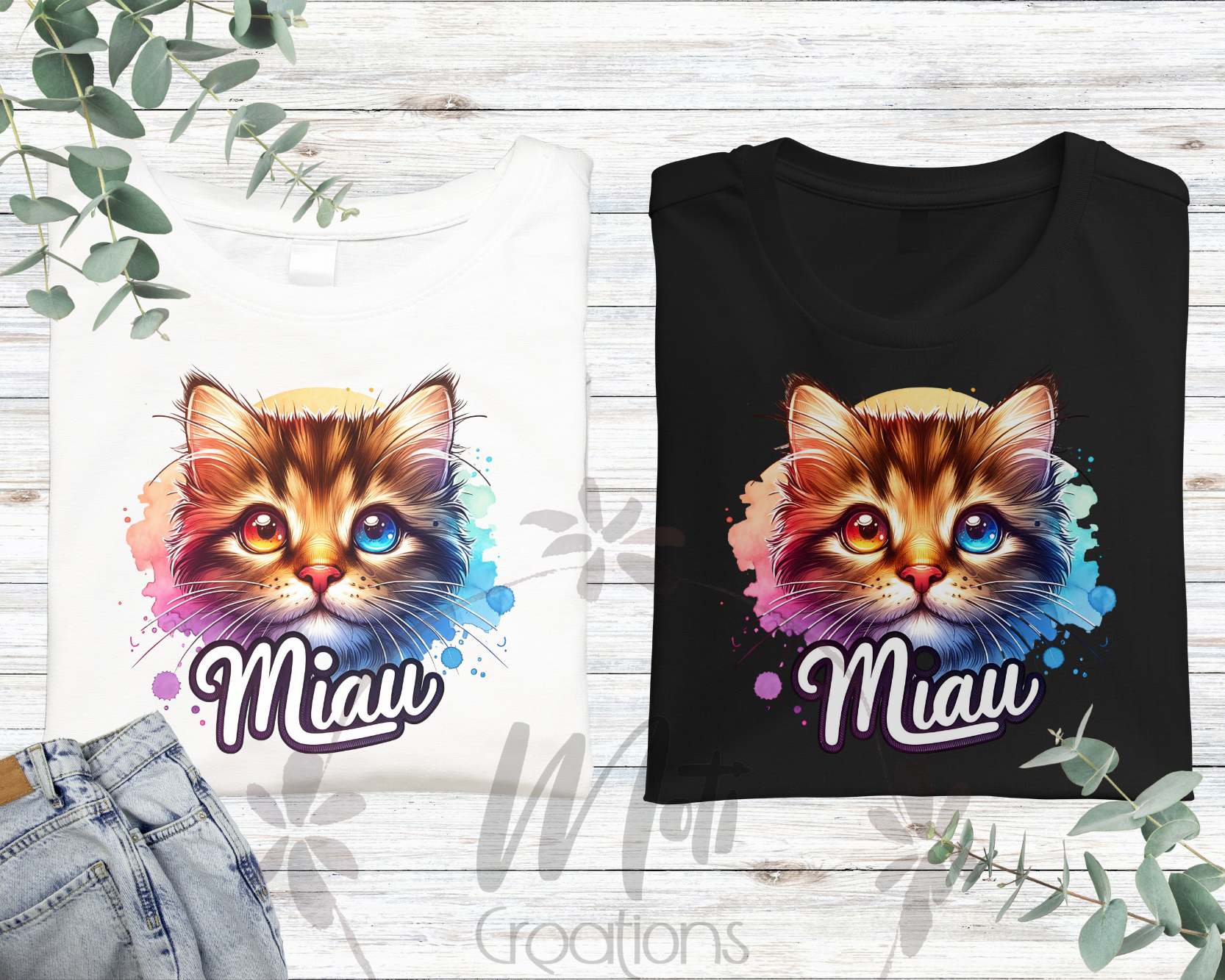 a pair of t - shirts with a cat's face on them