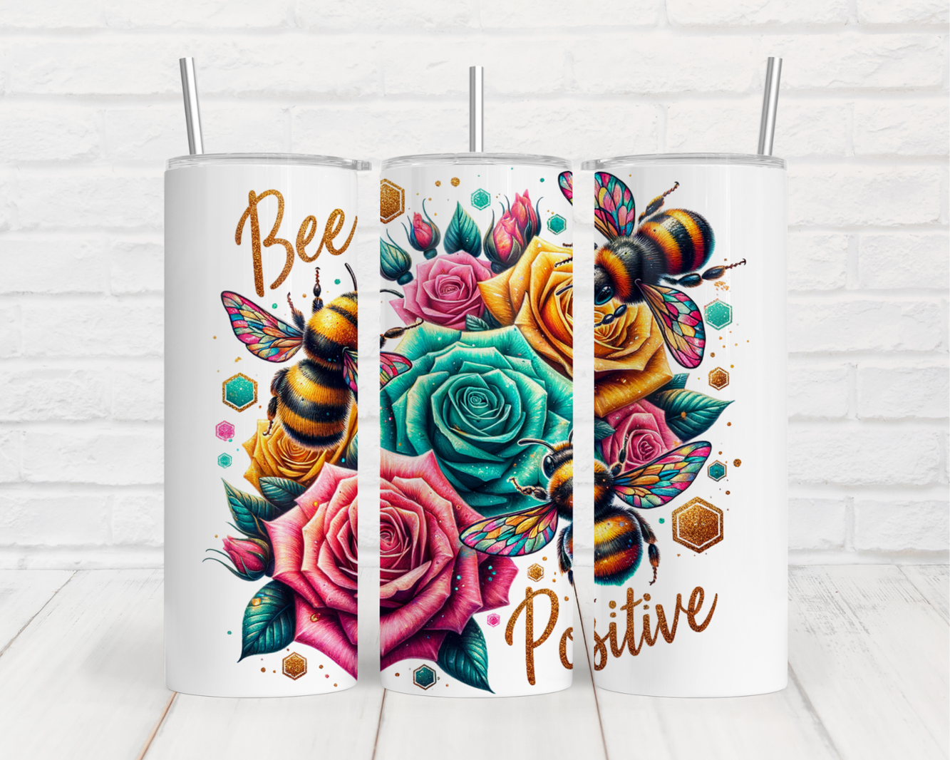 three coffee mugs with bees and roses on them
