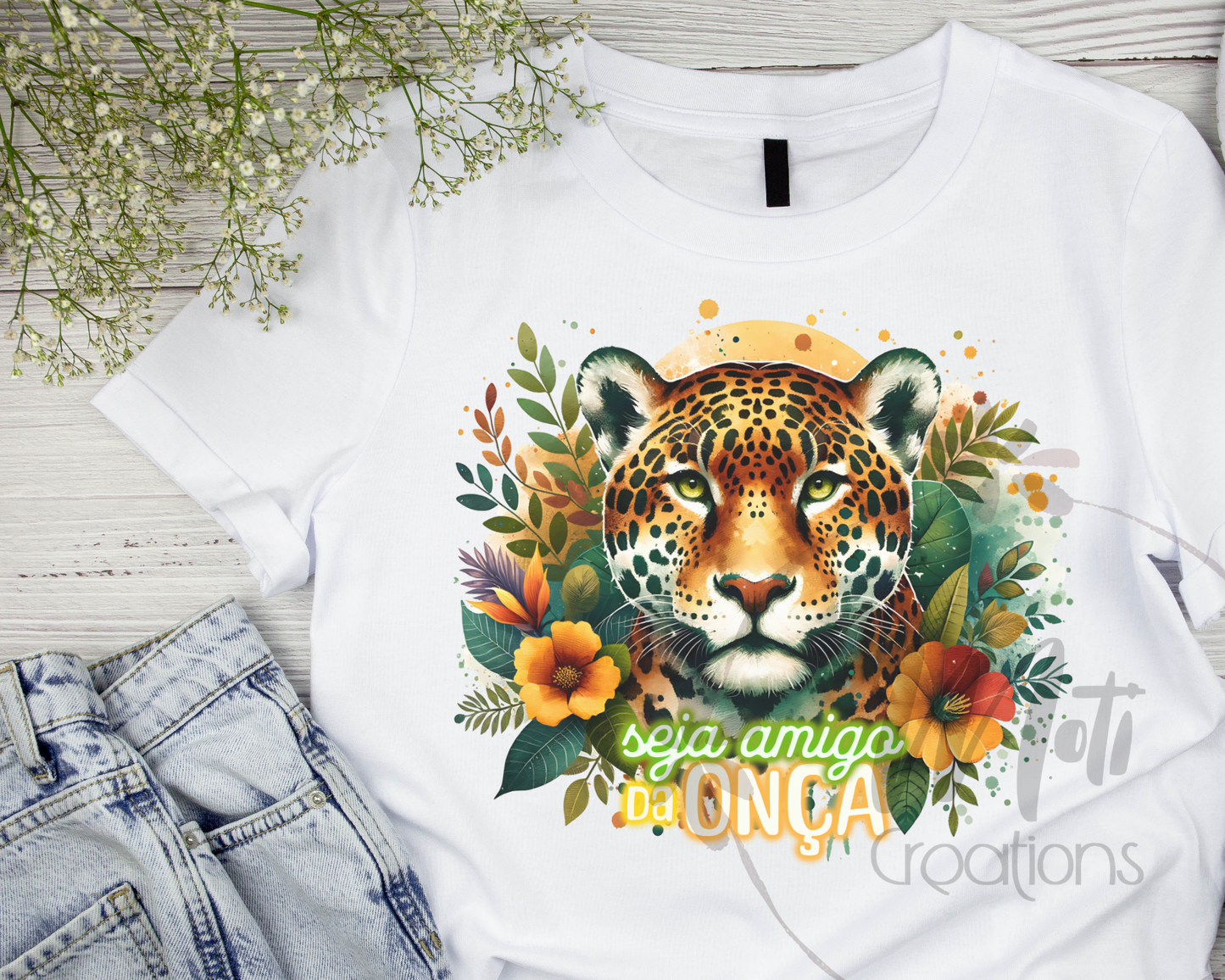 a t - shirt with a picture of a tiger on it