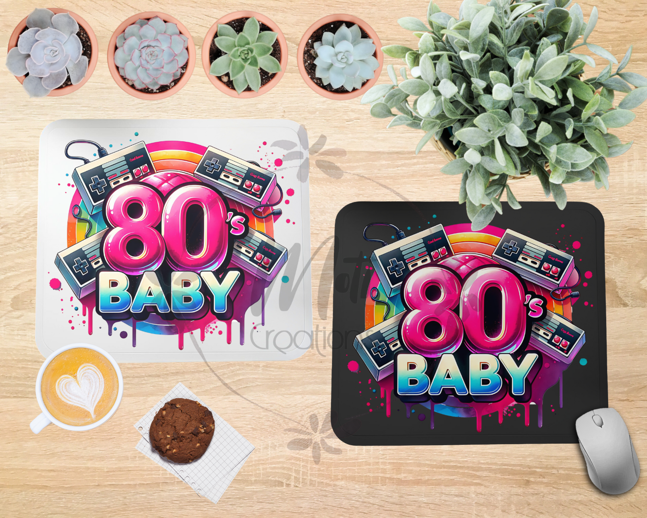 a couple of mouse pads sitting on top of a wooden table