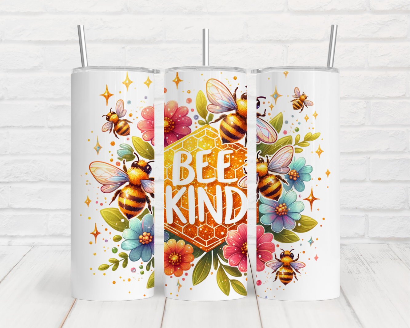 three white tumbles with bees and flowers on them