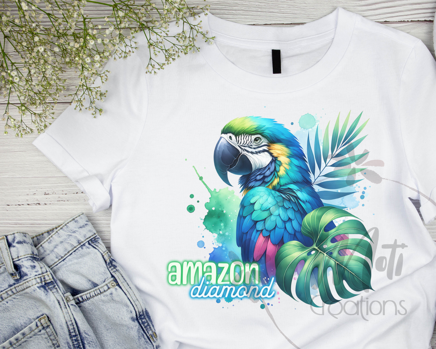 a white shirt with a blue and green parrot on it