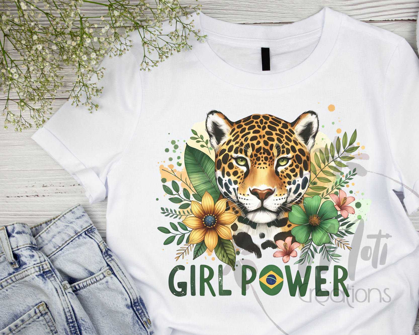 a t - shirt with a picture of a leopard on it