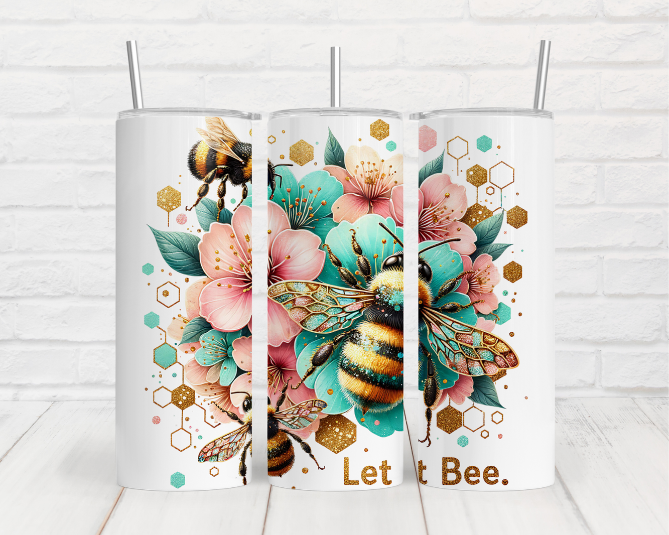 three coffee mugs with bees and flowers on them