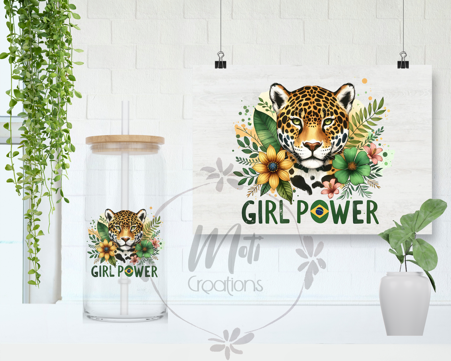 a picture of a girl power sign next to a potted plant